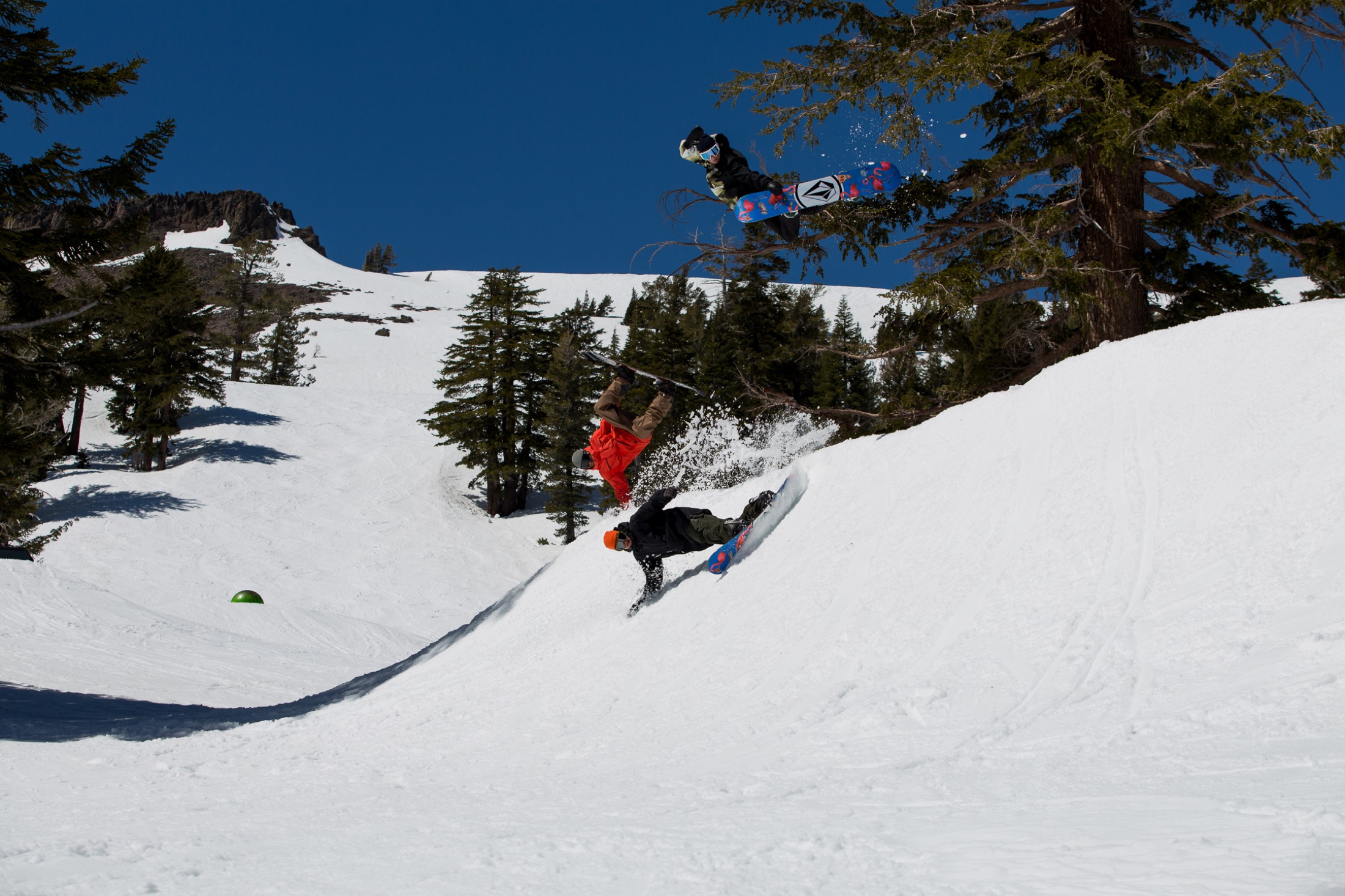 Rider airing a terrain park feature