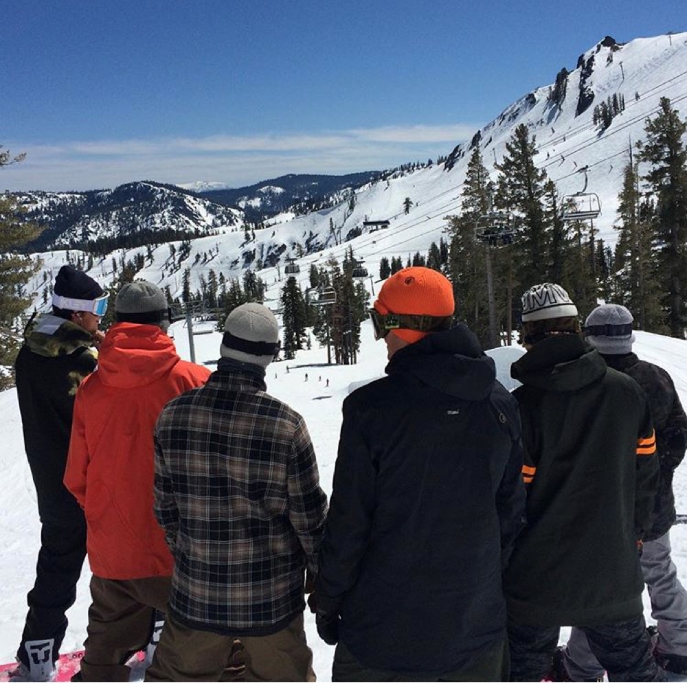 Team looking out over the mountain together